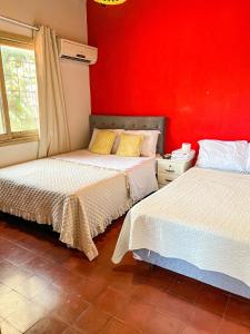 Кровать или кровати в номере Hotel Herrera