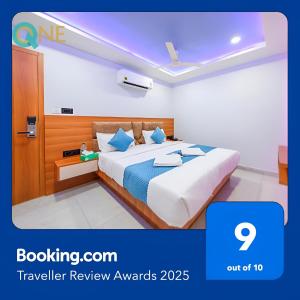 Postel nebo postele na pokoji v ubytování Glitz Hotels Q One - Nr Ernakulam Junction