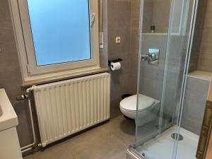 Bilik mandi di Chambre double chez Zhang