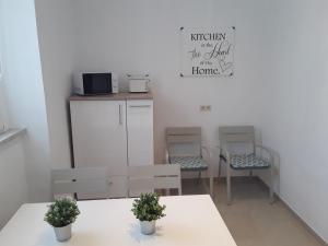 Η κουζίνα ή μικρή κουζίνα στο Ferienwohnung Weiland 80qm +10 φωτογραφίες