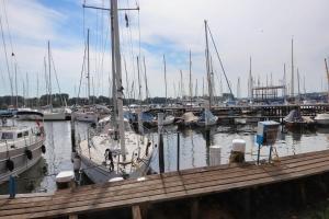 a group of boats docked in a marina at Finnenhaus 1 in Lübeck