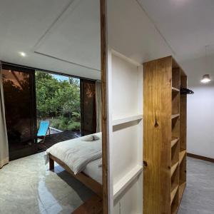 Letto o letti in una camera di CosyBe Villas
