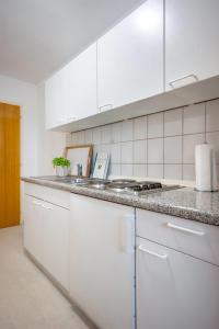 Η κουζίνα ή μικρή κουζίνα στο Knusthof - Wohnung 3