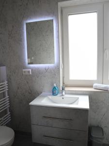 Ένα μπάνιο στο Apartment Havanna