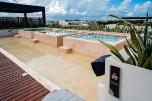 Bazén v ubytování Bloom Tulum Apartments nebo v jeho okolí