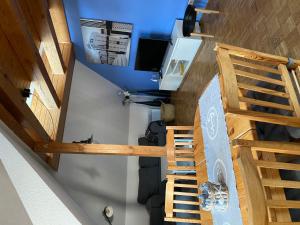 an overhead view of a room with a ladder and a desk at Harmonie in Prerow