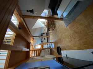 a view from the top of a house with a spiral staircase at Harmonie in Prerow
