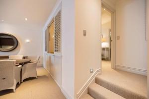 Voodi või voodid majutusasutuse Craigroy 3 Lakeshore apartment with conservatory toas