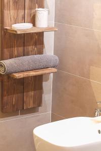 Kylpyhuone majoituspaikassa Dolomiti di Brenta House