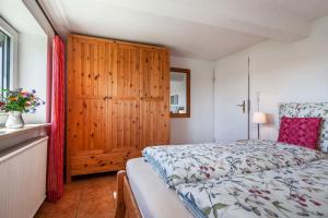 Postel nebo postele na pokoji v ubytování Ferienhaus Reetsommer