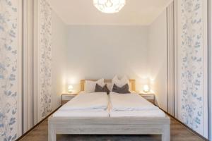 Un ou plusieurs lits dans un hébergement de l'établissement Käte Kate