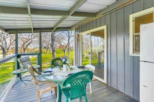 a patio with a table and chairs on a deck at Fish, Hike & Relax: Rural Red Bluff Cottage in Red Bluff