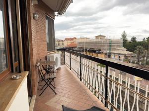 a balcony with a view of a city at Private Garage, 300m from Sea in Alassio Centre in Alassio