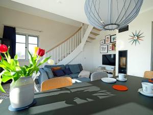 Televisyen dan/atau pusat hiburan di Time out Comfortable holiday residence