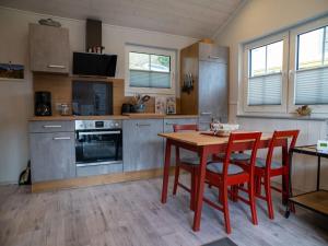 Η κουζίνα ή μικρή κουζίνα στο "An de Kapell" Comfortable holiday residence