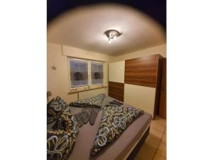 Ένα ή περισσότερα κρεβάτια σε δωμάτιο στο Beach Crab Comfortable Holiday Residence