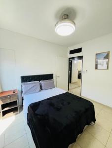 Postel nebo postele na pokoji v ubytování Apart Dos Naciones