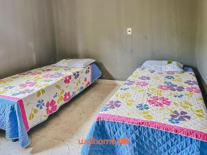 En eller flere senge i et værelse på Casa em Ilheus com Piscina Próxima a Praia + 26 billeder