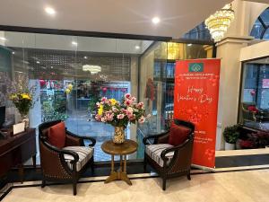 Charmpearl Hotel & Suites的休息区