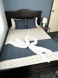 En eller flere senge i et værelse på Paraiso Valle Azul