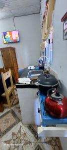 Η κουζίνα ή μικρή κουζίνα στο Hospedaje Espindoliky +12 φωτογραφίες