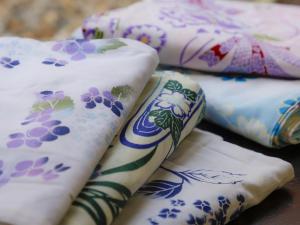 籠屋mizunotoオーベルジュ客房内的一张或多张床位