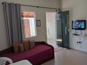 Μια τηλεόραση ή/και κέντρο ψυχαγωγίας στο Flat Solife 3 Cabo Frio-Búzios