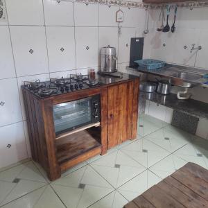 Køkken eller tekøkken på Temporada Capuba Jacaraípe ES