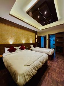 Letto o letti in una camera di Lazimpat Boutique Hotel