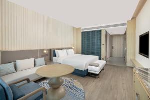 Postel nebo postele na pokoji v ubytování C&D Hotel Dongshan Zhangzhou