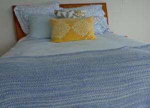 Ένα ή περισσότερα κρεβάτια σε δωμάτιο στο Orewa Beachfront Apartment