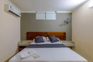 Ένα ή περισσότερα κρεβάτια σε δωμάτιο στο Hotel Don Fermin