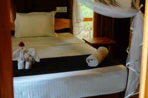 Letto o letti in una camera di Jungle View River Camping