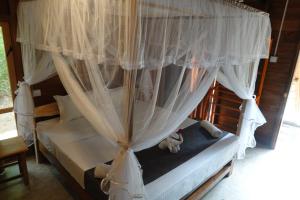 Letto o letti in una camera di Jungle View River Camping