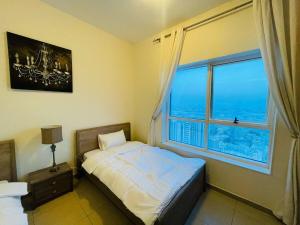 Postel nebo postele na pokoji v ubytování Luxury Sea View ROOM with 2 BED