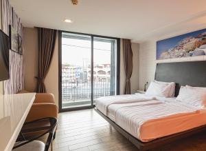 Postel nebo postele na pokoji v ubytování BBHouse Khlongtan + 37 fotografií