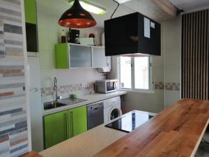 Kuchyň nebo kuchyňský kout v ubytování Isla cristina, playa central