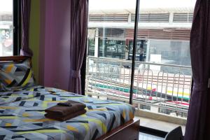 Letto o letti in una camera di Baan Mulan