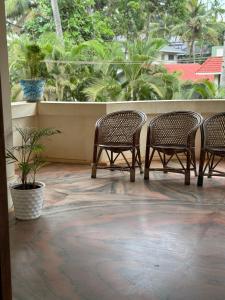 Μπαλκόνι ή βεράντα στο beach view balcony resort by hello varkala