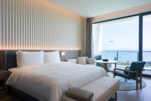 Postel nebo postele na pokoji v ubytování C&D Hotel Dongshan Zhangzhou