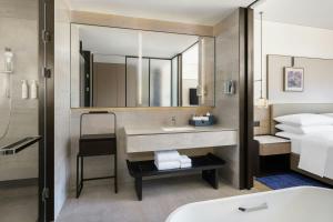 Voodi või voodid majutusasutuse Jieyang Marriott Hotel toas