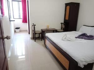 Postel nebo postele na pokoji v ubytování Hotel RJ INN