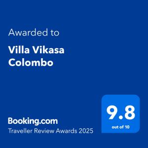 a screenshot of a cell phone with the text awarded to villa vyssa at Villa Vikasa Colombo in Colombo
