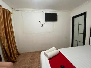 TV o dispositivi per l'intrattenimento presso RedDoorz Syariah at Sudirman Street Garut