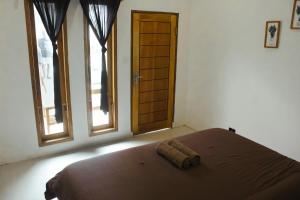 Postel nebo postele na pokoji v ubytování Zavana House