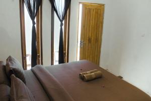 Postel nebo postele na pokoji v ubytování Zavana House