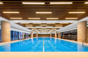 Bazén v ubytování Wyndham Putian Downtown nebo v jeho okolí