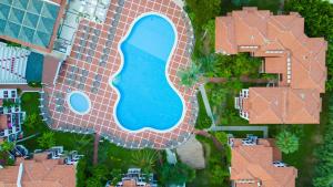Bazén v ubytování Alize Hotel Oludeniz - All Inclusive nebo v jeho okolí
