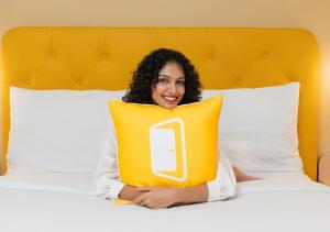 Postelja oz. postelje v sobi nastanitve Bloom Hotel - Jayanagar