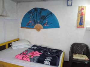 Postel nebo postele na pokoji v ubytování Hang Heem Homestay